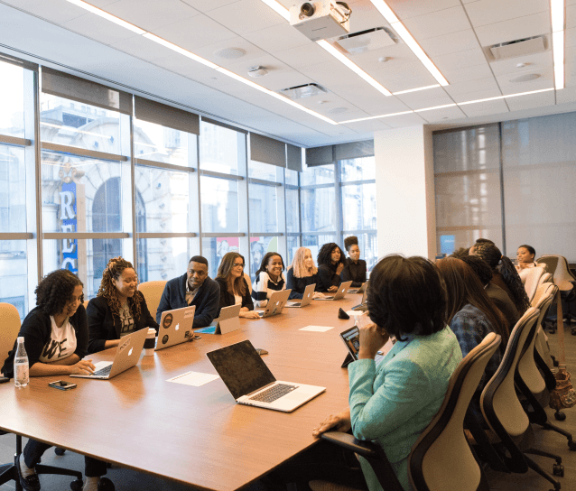 Nigerian professionals collaborating in a wellness-focused workplace
